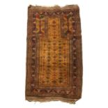 A HAND KNOTTED PERSIAN WOOL BELOUCH PRAYER RUG, LATE 19TH / EARLY 20TH CENTURY, with flat weave