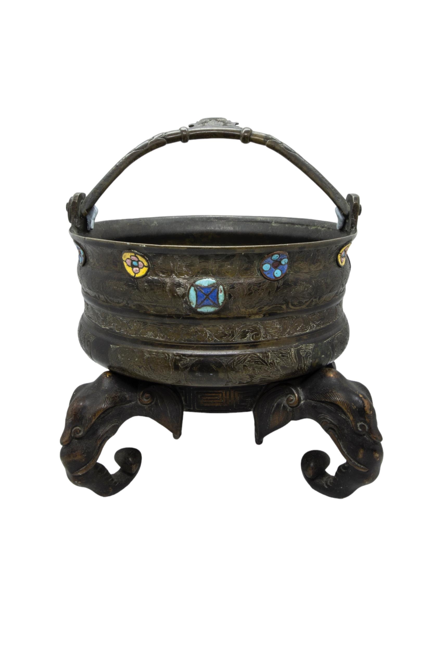 AN INDIAN BRASS PAIL, LATE 19TH / EARLY 20TH CENTURY, profuse chased decoration with enamelled