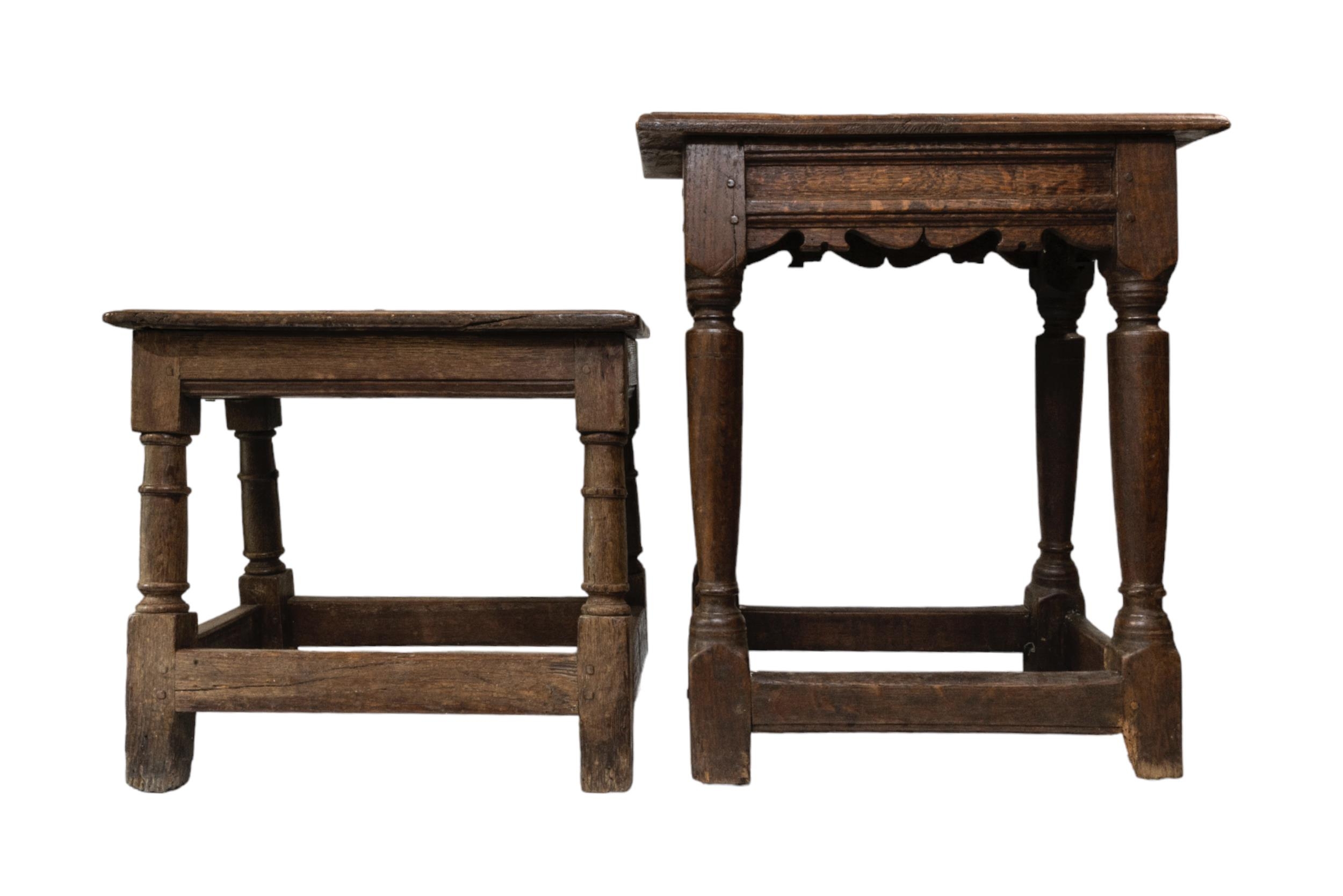 TWO OAK JOINT STOOLS, 18TH CENTURY, both with moulded seat panels raised on ring turned legs