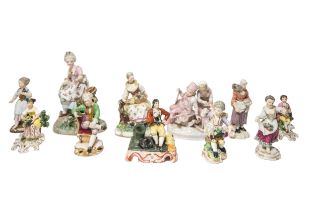 A MIXED GROUP OF ELEVEN PORCELAIN FIGURINES, 18TH/19TH CENTURY, including Vienna and Dresden figures