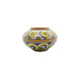 AN ITALIAN FAIENCE VASE, PROBABLY 18TH CENTURY, compressed globular form, painted with lobed pattern