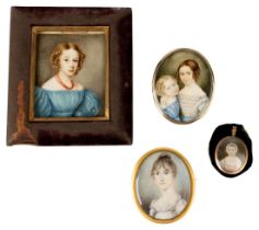 A REGENCY PORTRAIT MINIATURE OF TWO YOUNG GIRLS, the reverse of the case with a woven hair memorial,