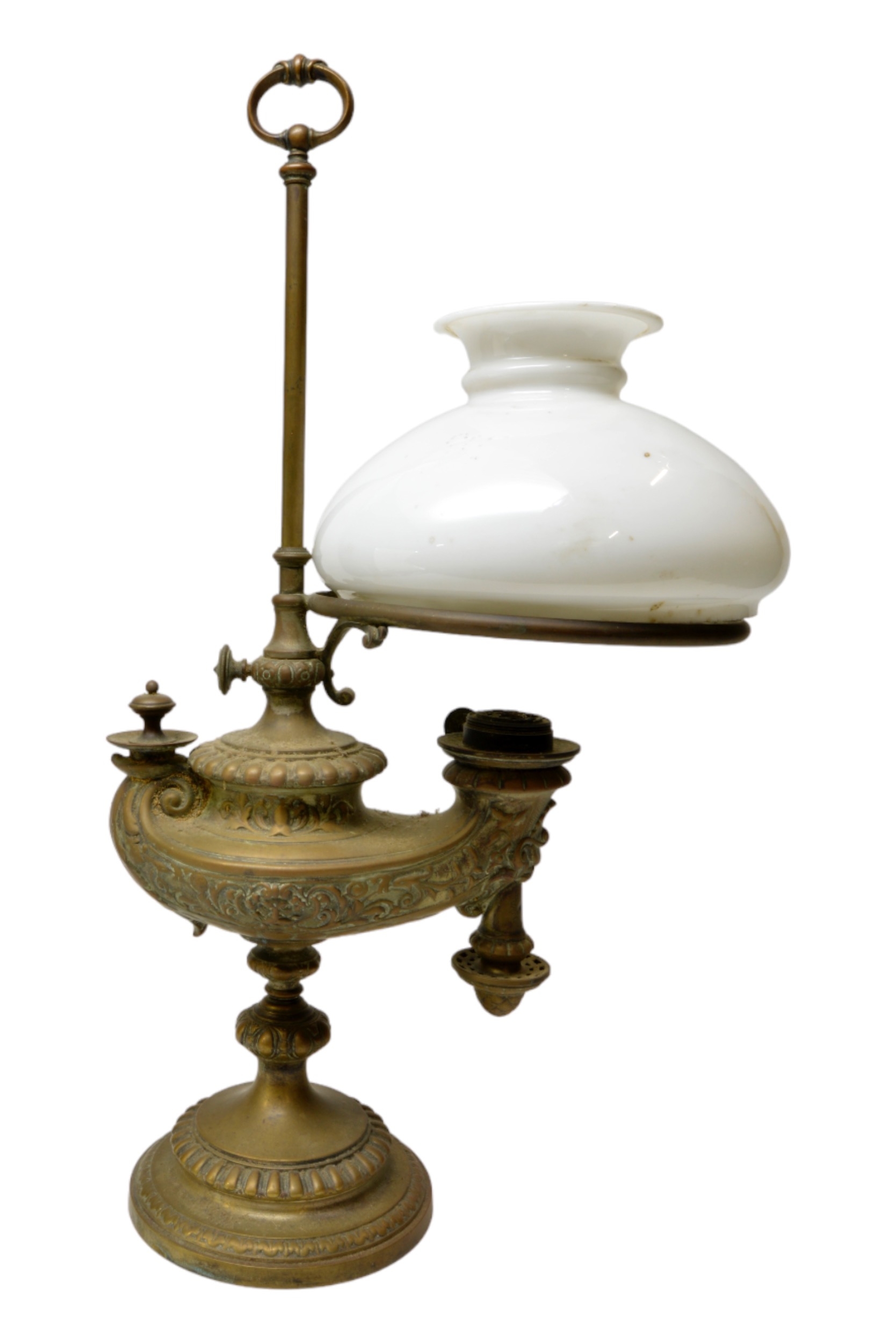 A WILD & WESSEL ORNATE BRASS 'VESTA' ADJUSTABLE OIL LAMP with associated glass shade. 54.5 cms