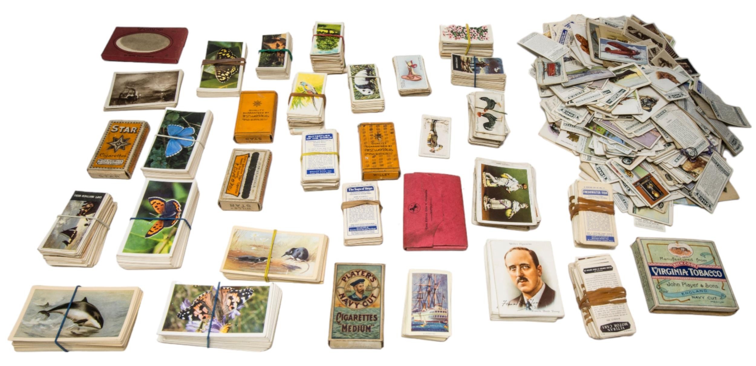 A QUANTITY OF CIGARETTE CARDS, to include Players, Wills’s etc, many mounted in official albums,