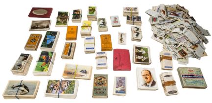 A QUANTITY OF CIGARETTE CARDS, to include Players, Wills’s etc, many mounted in official albums,