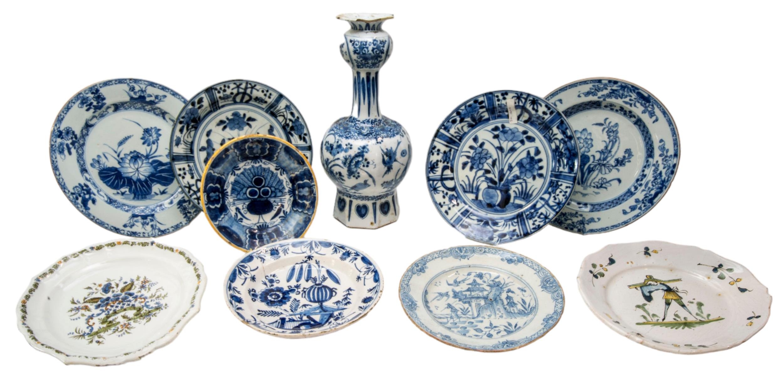A MIXED GROUP OF NINE DELFT DISHES AND A BOTTLE VASE, 18TH CENTURY AND LATER, the dishes include two