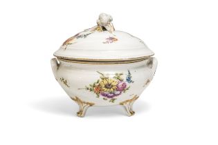 AN 18TH CENTURY EUROPEAN TUREEN AND COVER Painted floral springs with cauliflower and vegetable