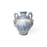 A LARGE FAIENCE VASE 19th century, painted with mythological scene and a crest, 19th century,