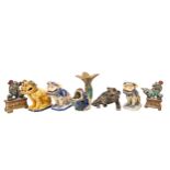 A MIXED GROUP OF CHINESE POTTERY FOO DOG MODELS AND A FISH MODEL, the lot includes a pair of dogs