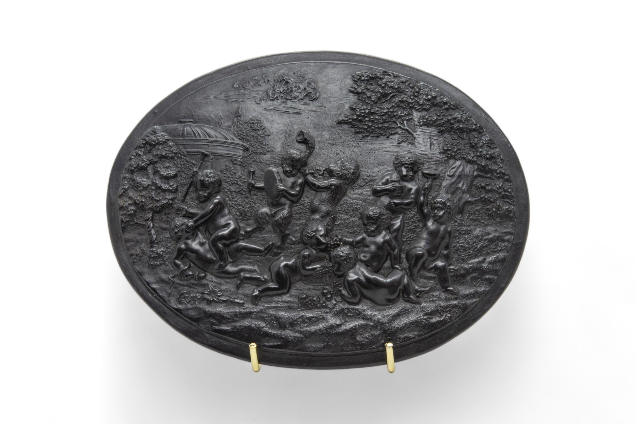 A WEDGWOOD OVAL BASALT PLAQUE Circa 1780, moulded with bacchantes in a landscape, together with - Image 4 of 7