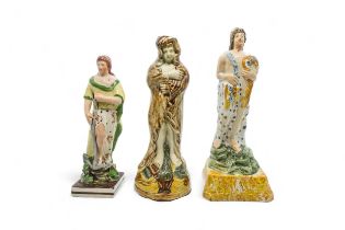 THREE PEARLWARE FIGURES Early 19th century, tallest is 23cms high