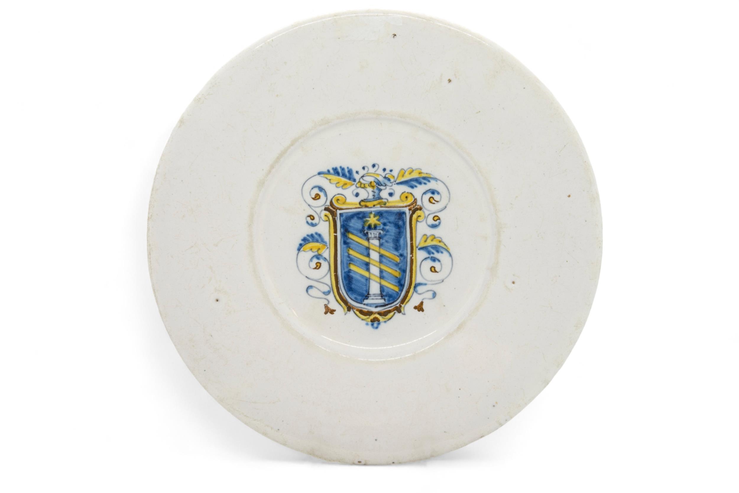 A 17TH CENTURY ITALIAN ARMORIAL PLATE Circa 1680, 24cms wide