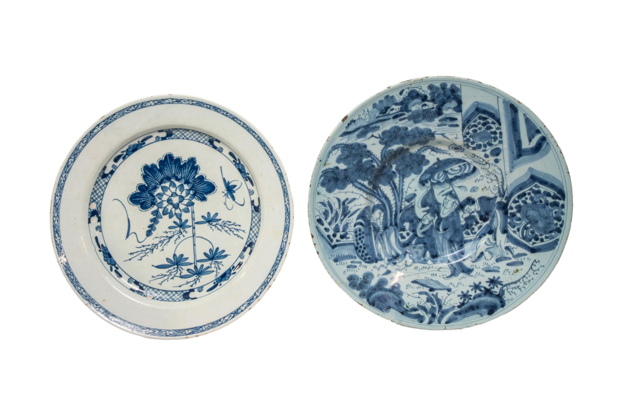 FIVE TIN GLAZED CHARGERS 18th century, including a Bristol example in the Niglet style, 33cms wide - Image 2 of 6