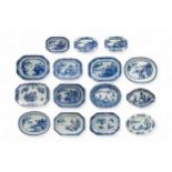A GROUP OF FIFTEEN CHINESE BLUE AND WHITE SERVING DISHES QING DYNASTY, 18TH CENTURY largestest