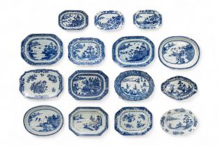 A GROUP OF FIFTEEN CHINESE BLUE AND WHITE SERVING DISHES QING DYNASTY, 18TH CENTURY largestest