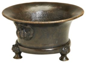 A CAST BRONZE TRIPOD CENSER MING DYNASTY, 15TH-17TH CENTURY with a generous flaring rim with two