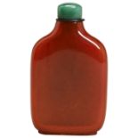 AN AMBER SNUFF BOTTLE WITH A GREEN JADE STOPPER 19TH/20TH CENTURY  a natural yellow amber with a