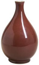 A COPPER-RED GLAZED VASE, YUHUCHUNPING YONGZHENG SIX CHARACTER MARK AND OF THE PERIOD  the pear-