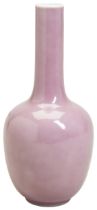 A 'PEACHBLOOM-GLAZED' BOTTLE VASE LATE QING DYNASTY with an apocryphal Kangxi six character mark