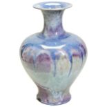 A LARGE FLAMBE GLAZED BALUSTER VASE QING DYNASTY, 19TH CENTURY covered with a glaze of crushed