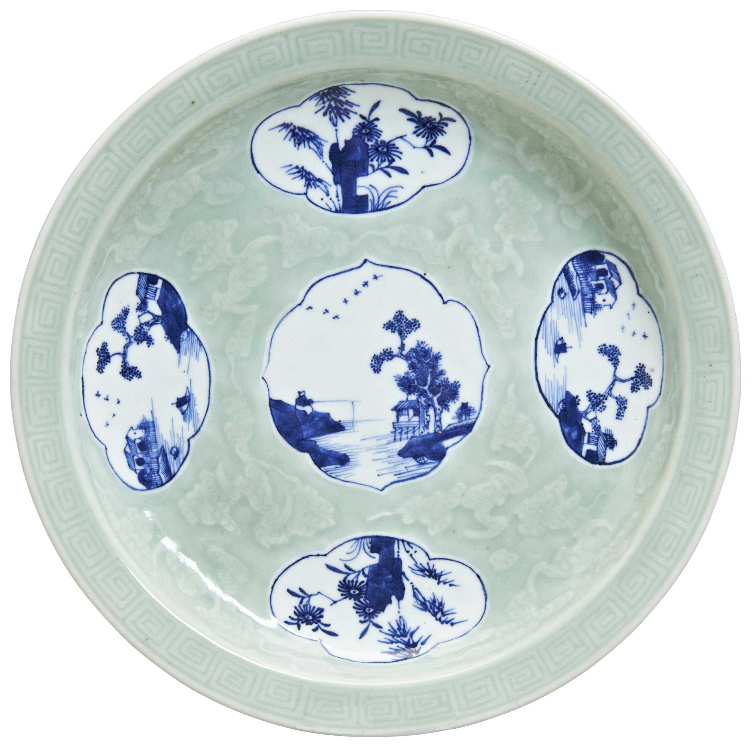 AN UNDER-GLAZED BLUE CELADON-GROUND 'LANDSCAPES' DISH QING DYNASTY, 19TH CENTURY the circular dish - Image 2 of 2