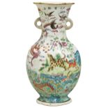 A GOOD FAMILLE ROSE 'ANIMALS & MYTHICAL BEASTS' VASE QING DYNASTY, 19TH CENTURY 清 十九世纪 粉彩 ’风云际会’ 图纹瓶