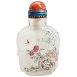 A CHINESE REVERSE PAINTED GLASS SNUFF BOTTLE  20TH CENTURY  depicting a garden scene with butterfly,