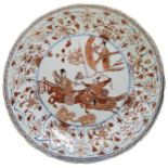 A CHINESE EXPORT ROUGE-DE-FER DISH KANGXI PERIOD (1662-1722) decorated with a scene from "The