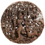 A CIRCLE WOODEN PANEL OF AN EAST ASIAN GODDESS 20TH CENTURY  hand carved wooden panel, depict a