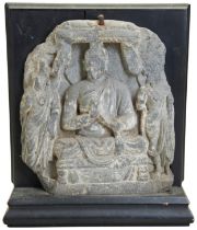 A BUDDHA STELES  2ND/3RD CENTURY  carved in deep relief with Buddha seated in the center. With