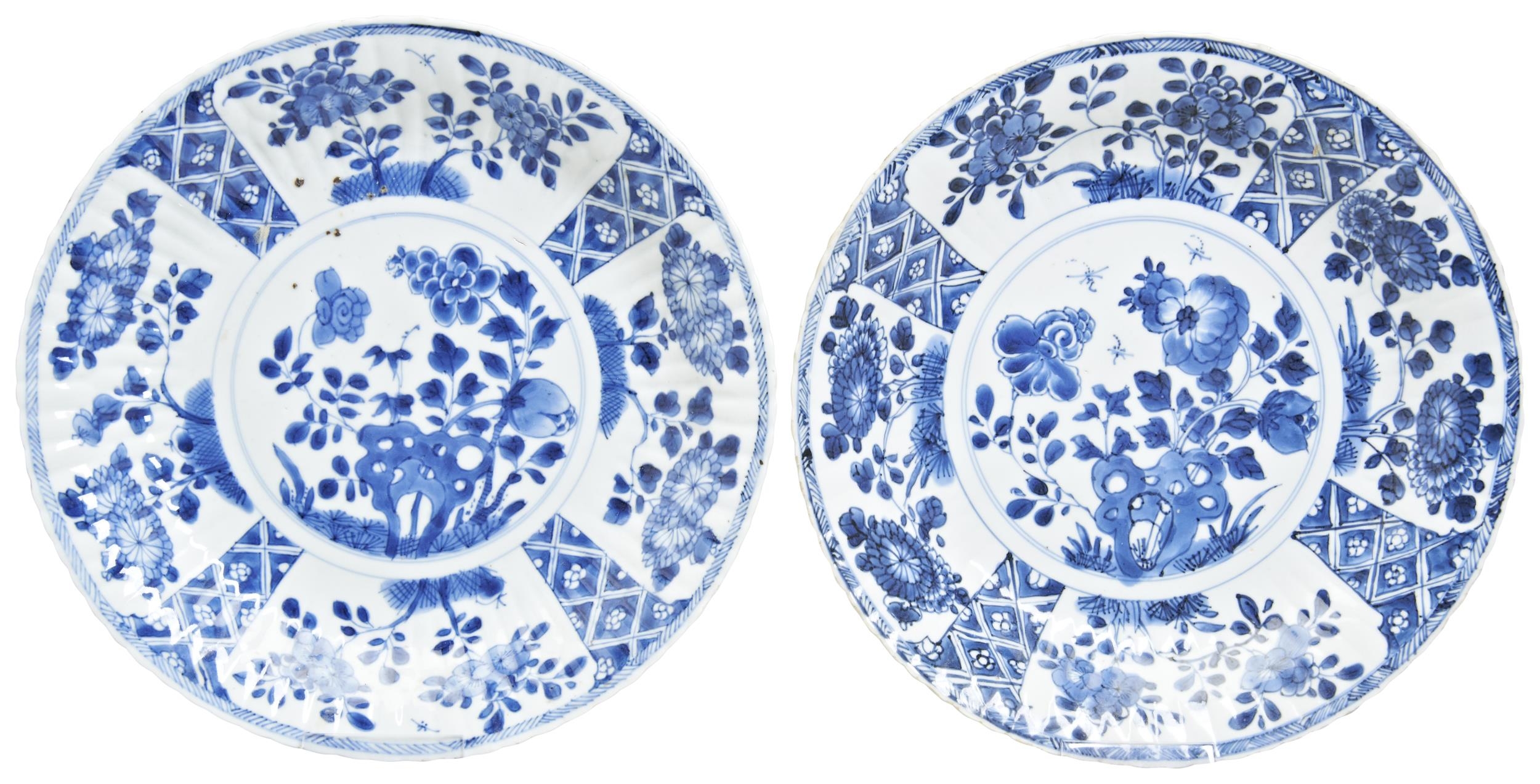 A PAIR OF BLUE AND WHITE DISHES KANGXI PERIOD (1662-1722) in the Kraak style 27cm diam PROVENANCE: