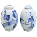 A MATCHED PAIR OF KANGXI COVERED CADDIES KANGXI PERIOD (1662-1722)  depicting a garden scene of lady