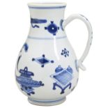 A BLUE AND WHITE PORCELAIN JUG KANGXI PERIOD (1662-1722) painted with the hundred antiquities scene.