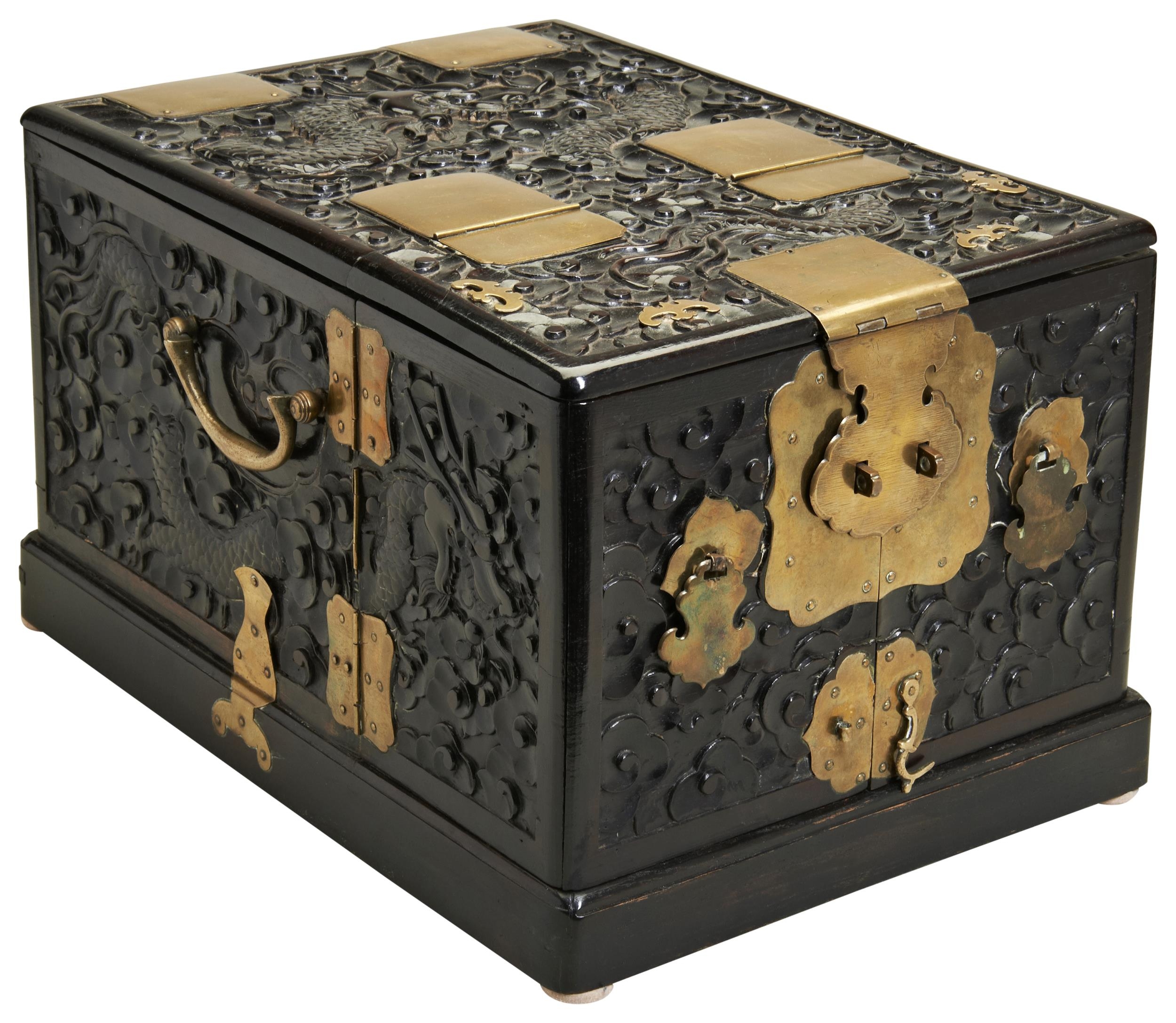 A CARVED HARDWOOD 'DRAGON' DRESSING BOX QING DYNASTY, 19TH CENTURY with gilt-metal fitted, the