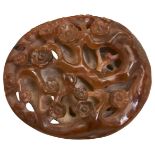 A CARVED AGATE PAPERWEIGHT 19TH/20TH CENTURY  openwork and carved 'three winter friends', plum