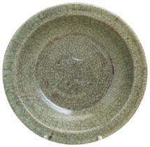 A 'LONGQUAN' CELADON DOUBLE FISH DISH YUAN/MING DYNASTY covered all over in a crackle-suffused