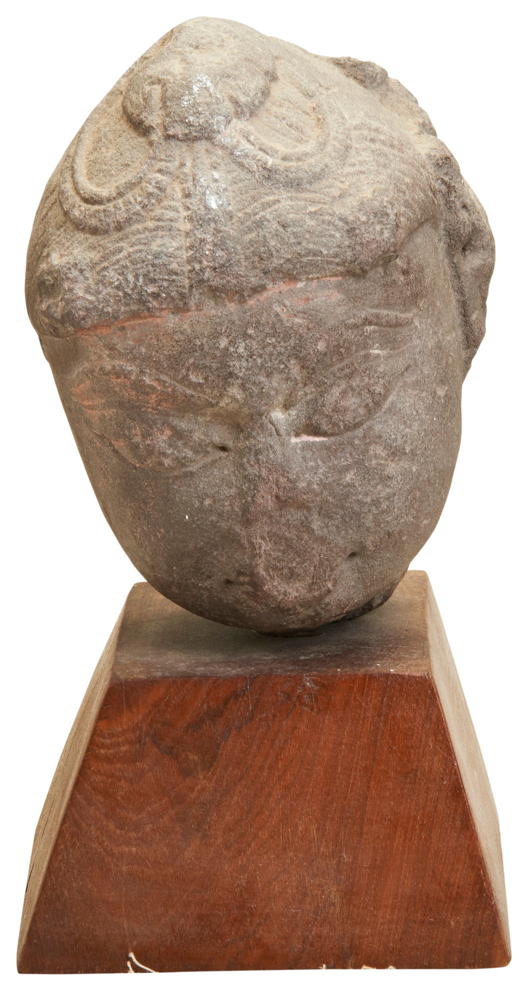 A FEMALE HEAD STONE WITH HEADDRESS LATE GUPUTA PERIOD (320-600 AD)  a red sandstone carved female
