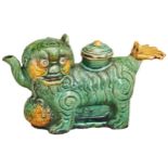 A RARE BUDDHIST LION GREEN-AND-AMBER GLAZED WINE POT KANGXI PERIOD (1662-1722) 清康熙 素三彩水丞 modelled