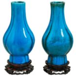 A PAIR OF TURQUOISE-GLAZED VASES KANGXI PERIOD (1662-1722) of moulded flattened baluster form,