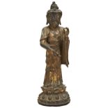 A GILT LACQUERED BRONZE STANDING BUDDHA MING DYNASTY (1368-1644)  cast wearing long robes,