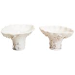 A MATCHED PAIR OF DEHUA LIBATION CUPS LATE MING DYNASTY one decorated in relief with a 'tiger,