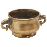 A BRONZE CENSER 17TH / 18TH CENTURY the compressed baluster body applied with two dragon-headed loop