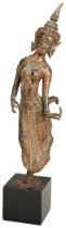 A GILT-BRONZE FIGURE OF A KHON DANCER THAILAND, LATE 19TH / EARLY 20TH CENTURY on a later wood stand