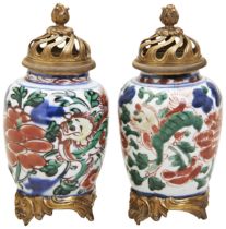 A PAIR OF WUCAI BRONZE MOUNTED VASES PORCELAIN TRANSITIONAL PERIOD, 17TH CENTURY decorated with
