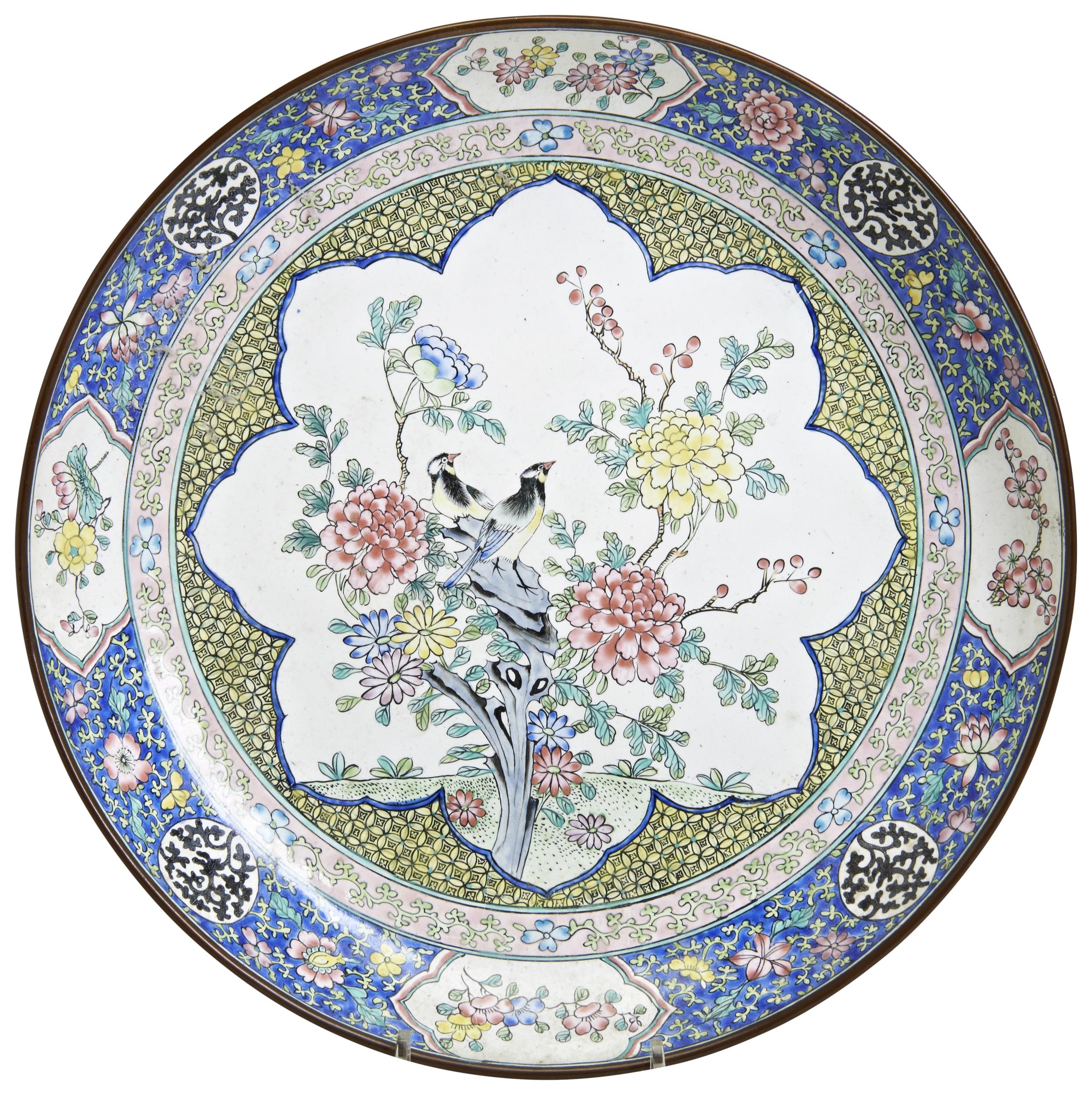 A FAMILLE ROSE CANTON ENAMEL DISH QINALONG PERIOD (1736-1795) painted with birds perched on rocks
