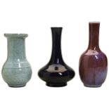 A COLLECTION OF THREE VASEES : AUBERGINE BOTTLE VASE, FLAMBE VASE AND CEALDON VASE 18TH/19TH CENTURY