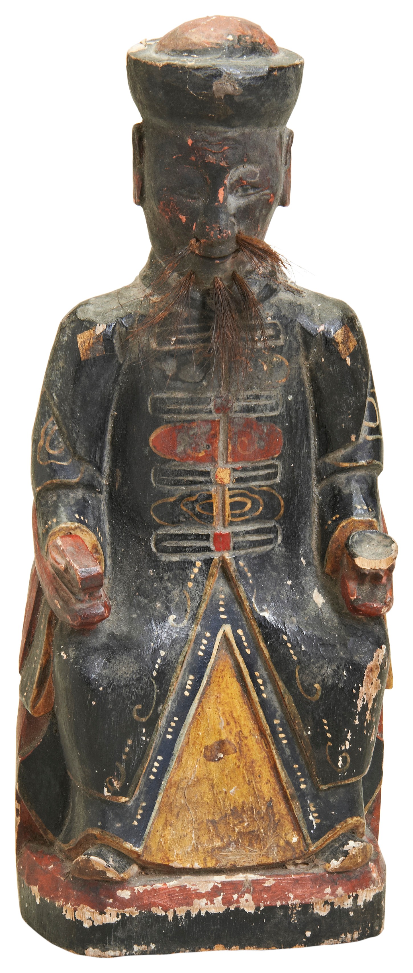 A CARVED LACQUERED WOOD FIGURE 19TH CENTURY a wooden figure probably a local god from the Southern