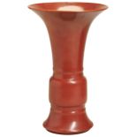 A CORAL-RED GU FORM VASE LATE QING / REPUBLIC PERIOD  covered all over in a rich coral-red glaze,