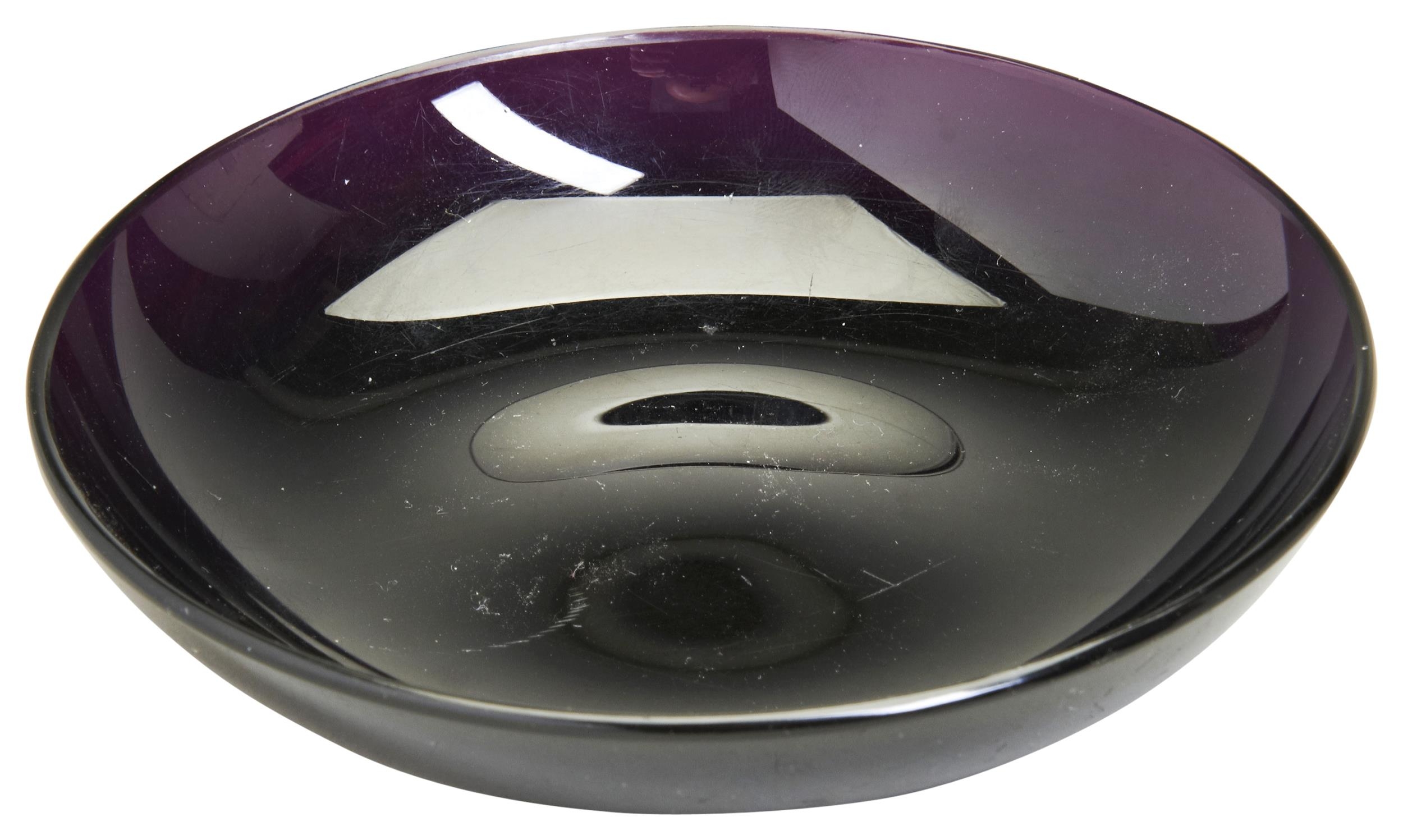 A SMALL CHINESE PURPLE GLASS BOWL QING DYNASTY, 19TH CENTURY a translucent shallow around purple