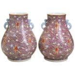 A PAIR OF FAMILLE ROSE PINK-GROUND 'BOYS' VASES, HU LATE QING / REPUBLIC PERIOD 清 粉彩童子持莲瓶一对 the